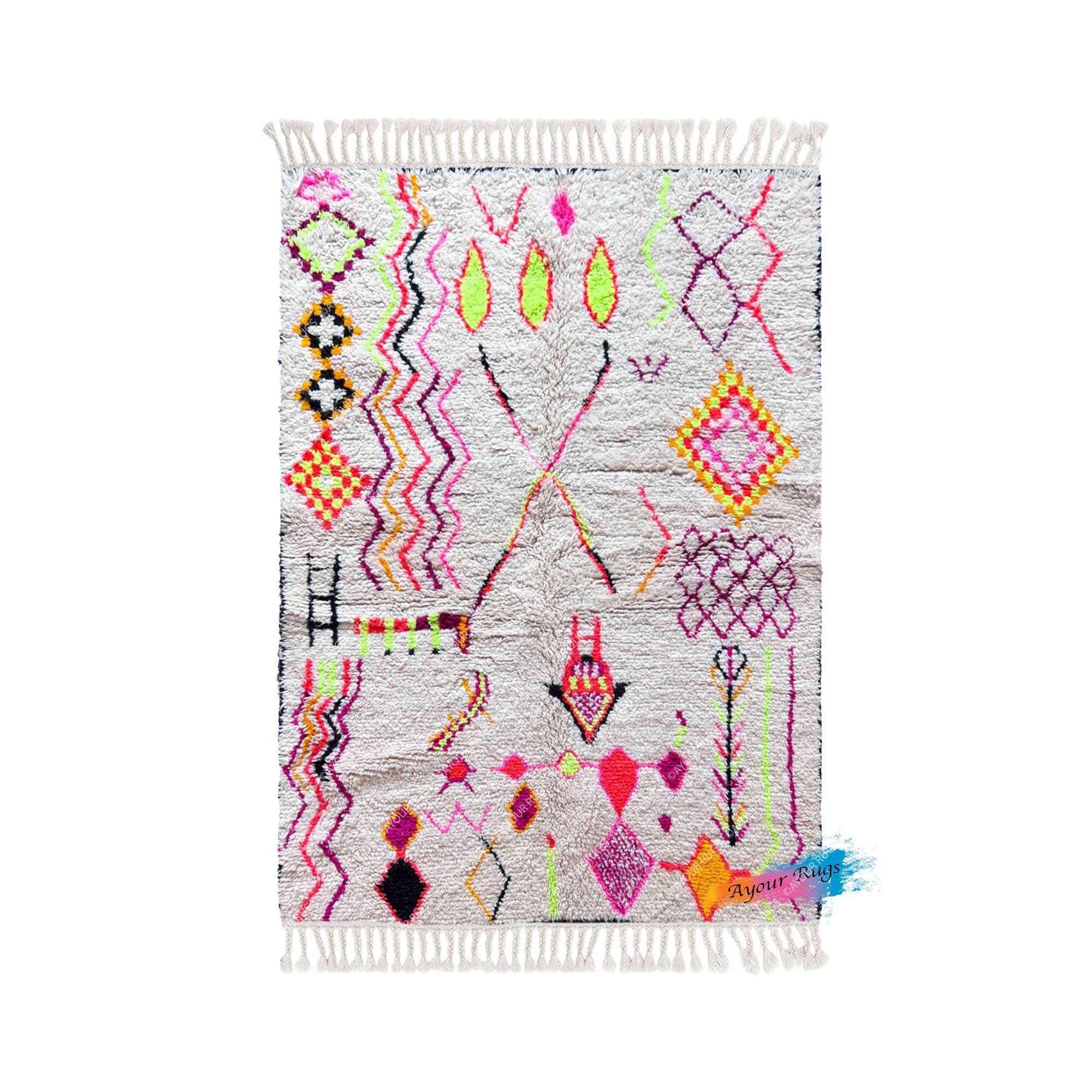 a vibrant, colorful rug with a variety of geometric patterns and shapes, including diamonds, triangles, and floral designs.